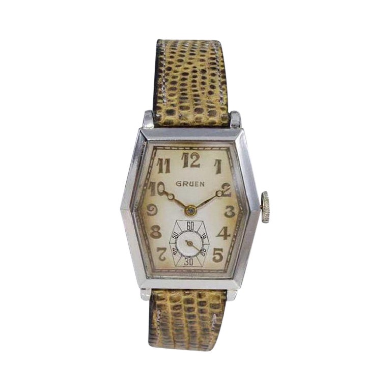 Reloj Gruen Tanque Art Decó relleno de oro blanco con correa original de 1931