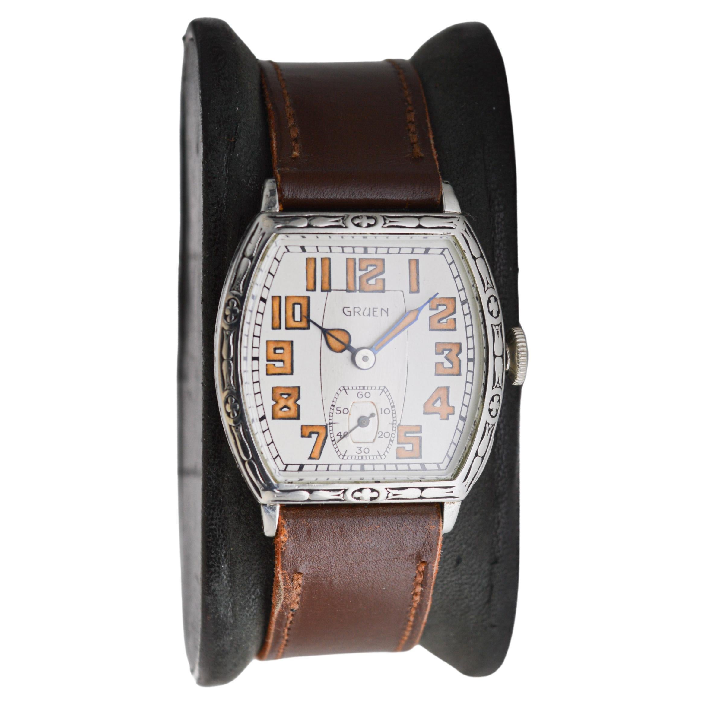 FACTORY / HOUSE: Gruen Watch Company
STYLE / REFERENCE: Art Deco Tonneau
METAL / MATERIAL: White Gold-filled
CIRCA / YEAR: 1925
DIMENSIONS / SIZE: Length 28mm X Diameter 35mm
MOVEMENT / CALIBER: Manual Winding / 15 Jewels / Caliber 885
DIAL / HANDS: