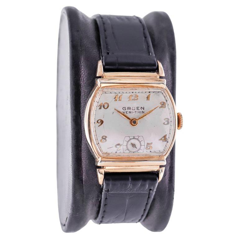 FACTORY / HOUSE: Gruen Watch Company
STYLE / REFERENCE: Art Deco Tortue Shape / Ref. 527
METAL / MATERIAL: Yellow Gold Filled
DIMENSIONS: Length 36mm X Width 27mm
CIRCA: 1940's 
MOVEMENT / CALIBER: Manual Winding /  15 Jewels / Cal. 421
DIAL /