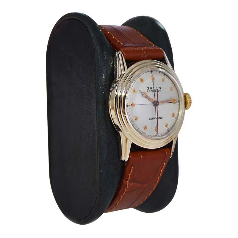 FACTORY / HOUSE: Gruen Watch Company
STYLE / REFERENCE: Art Deco
METAL / MATERIAL: Yellow Gold Filled 
CIRCA / YEAR: 1950's
DIMENSIONS / SIZE: Length 34mm X Diameter 28mm
MOVEMENT / CALIBER: Automatic Winding / 17 Jewels 
DIAL / HANDS: Silver
