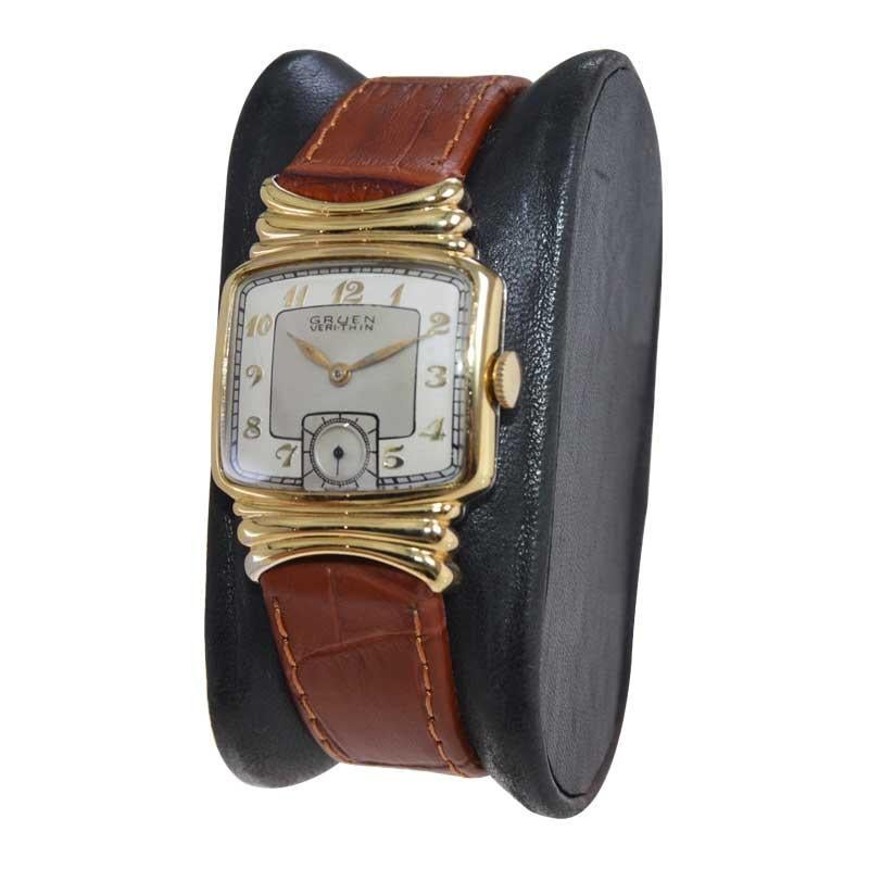 FACTORY / HOUSE: Gruen Watch Company
STYLE / REFERENCE: Art Deco 
METAL / MATERIAL: Yellow Gold Filled 
CIRCA / YEAR: 1940
DIMENSIONS / SIZE: Length 35mm x Width 26mm
MOVEMENT / CALIBER: Manual Winding / 17 Jewels / Cal.405 
DIAL / HANDS: Two Tone