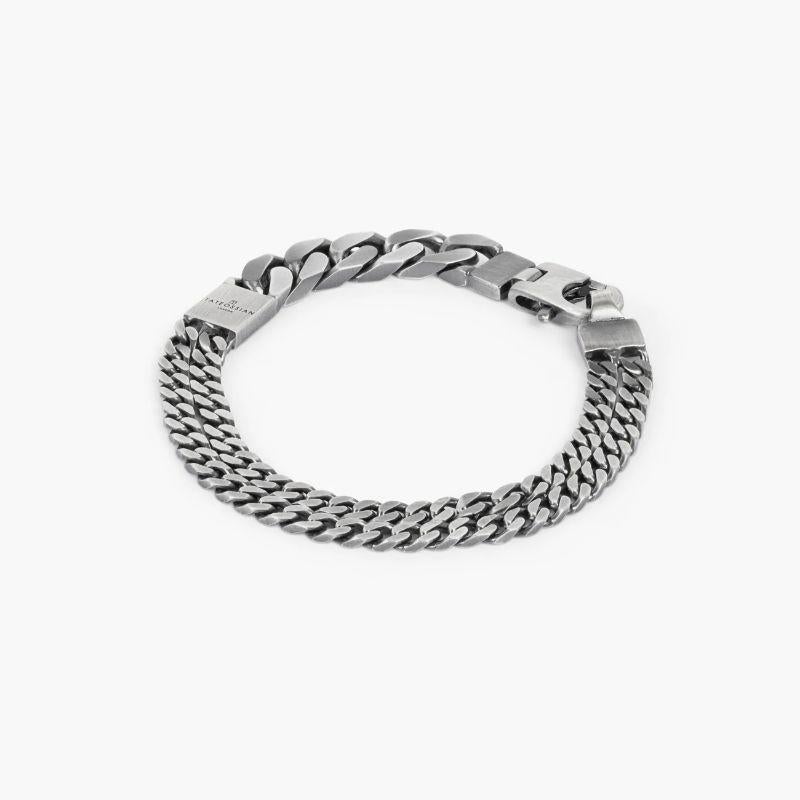 Grumette Duo Slim Bracelet in Oxidised Sterling Silver, Size L

A thick single chain fuses with two slimmer chains, creating a bold, statement bracelet, meticulously engineered in our Italian workshop. Finished with our lobster clasp in antique