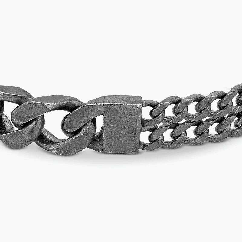 Grumette Duo Wide Bracelet in Oxidised Sterling Silver, Size M

A thick single chain fuses with two slimmer chains, creating a bold, statement bracelet, meticulously engineered in our Italian workshop. Finished with our lobster clasp in antique