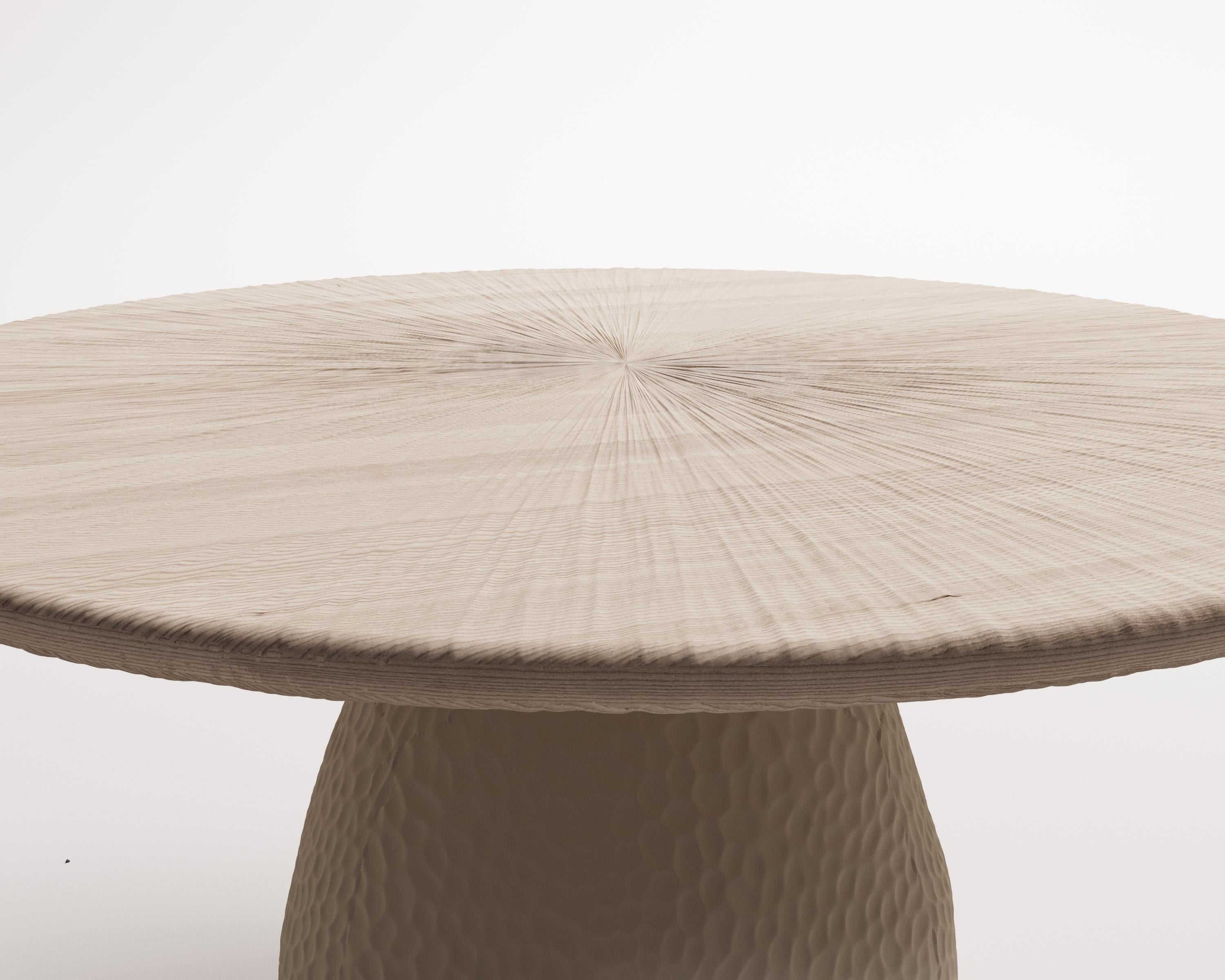 The table’s base, crafted from Yakusha’s signature eco-friendly ZTISTA material— an eco-conscious blend of clay, natural fibers, and organic biopolymer—is designed to resemble the rolling hills of Polissia. It is echoing the gentle contours of