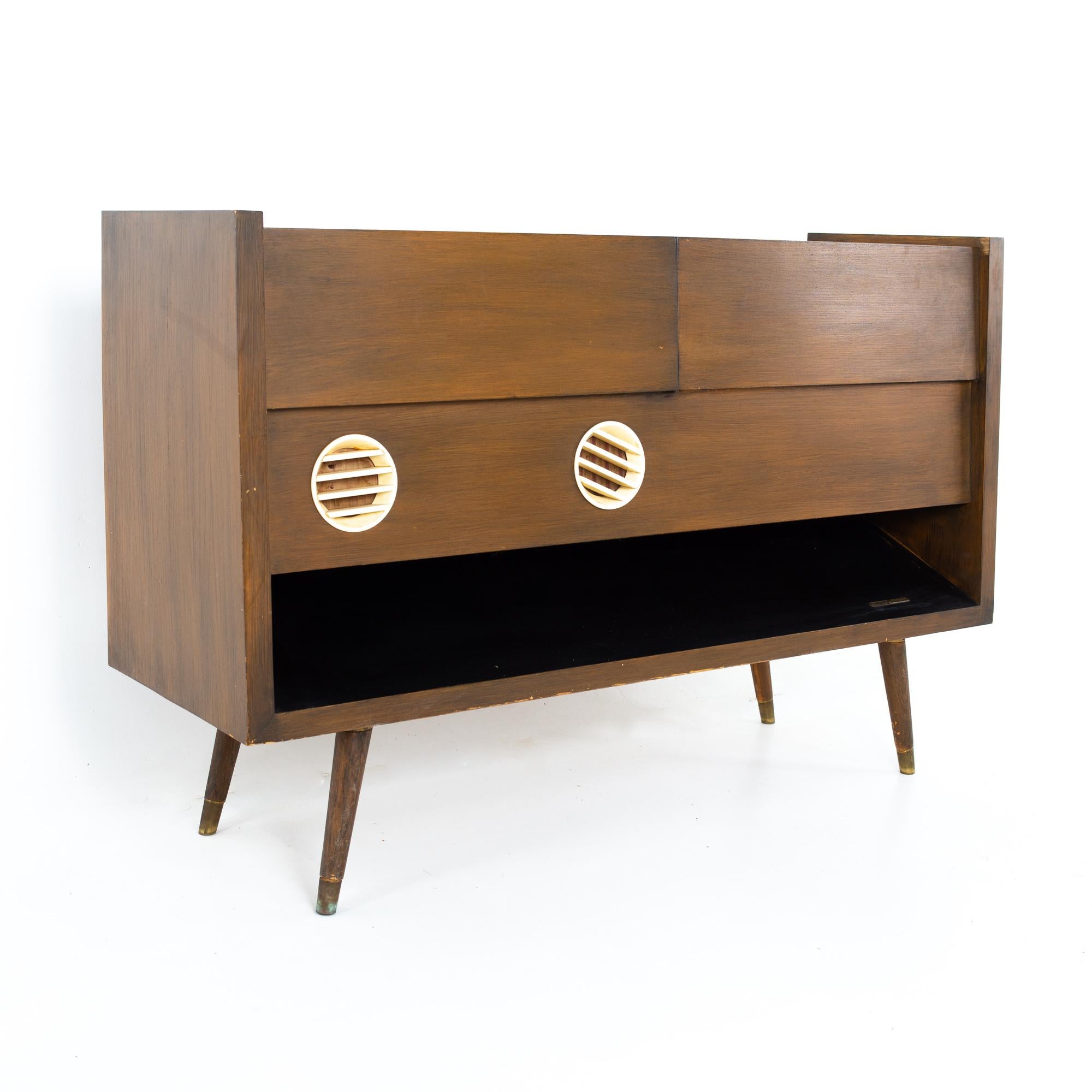 Grundig majestic Mid Century record console stereo
Stereo measures: 48.5 wide x 15 deep x 31.5 inches high

This price includes getting this piece in what we call restored vintage condition. That means the piece is permanently fixed upon purchase so