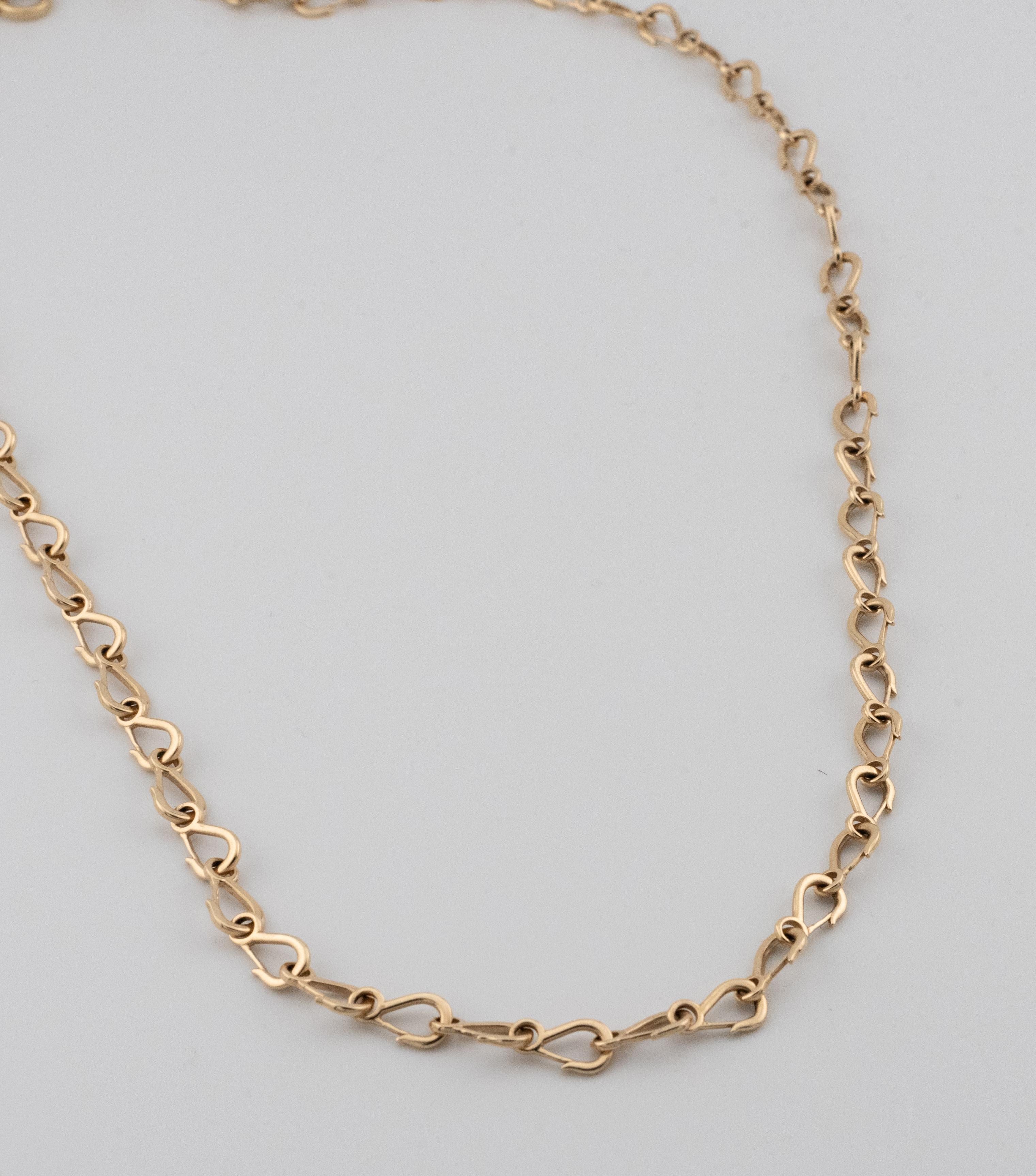 Grunfeld link 14k yellow gold necklace.
26” in length. Each link is hand welded together by artisans in Los Angeles, California. 27 grams. These links are one of a kind and cannot be found in mass production anywhere. Appraisal included with
