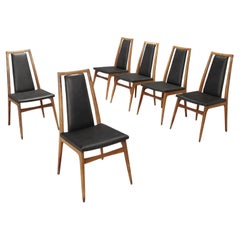 Gruppo di 6 sedie anni 60 con rivestimento in similpelle