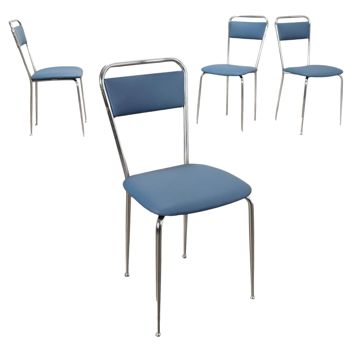 Gruppo di quattro sedie Anni 60, metallo e similpelle, azzurre