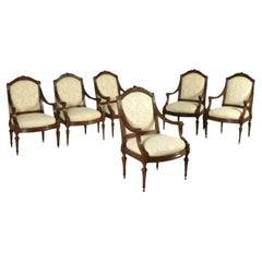 Groupe de six fauteuils Louis XVI en noyer, blanc et brun