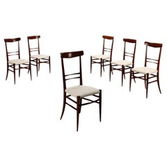 Groupe de six chaises restaurées des années 1950