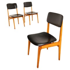 Group of three 1960s black and brown plywood and ebonized beech chairs