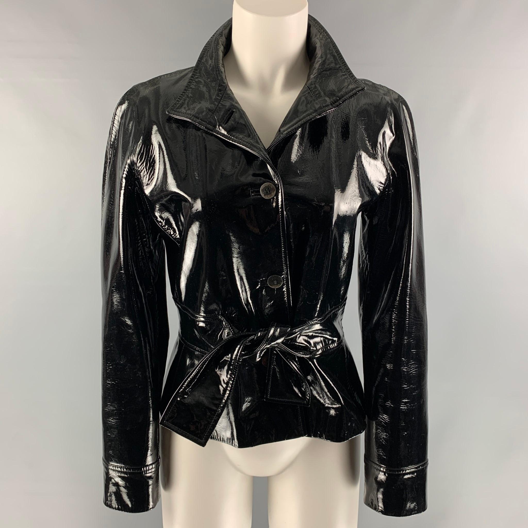 GRUPPO GFT jacket comes in a black goat leather with a full liner featuring a single breast, three bottom closure, and belt at waist. Made in Italy.

Very Good Pre-Owned Condition.
Marked: 8

Measurements:

Shoulder: 16 in.
Bust: 35 in.
Sleeve: 24