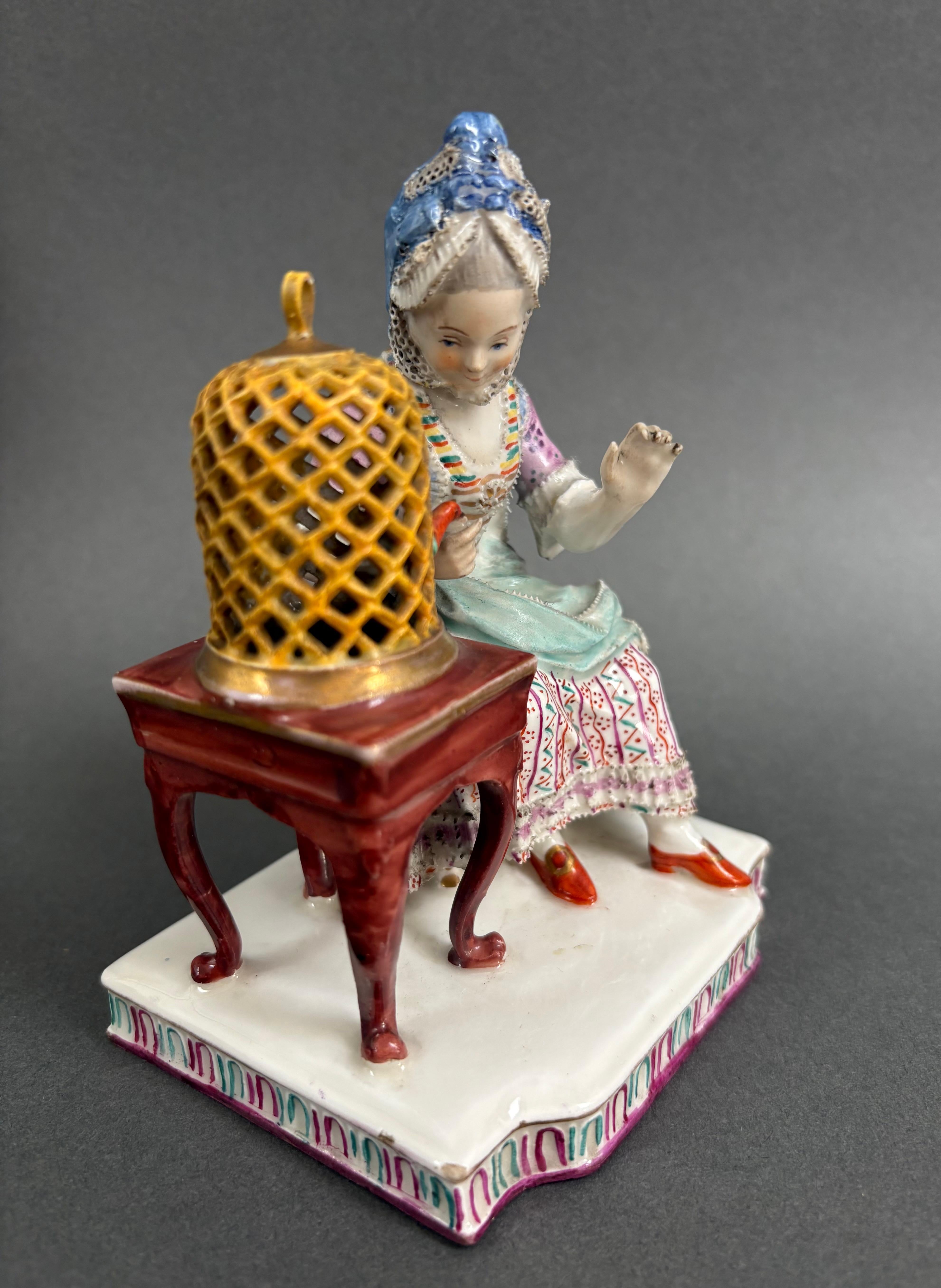 Grupo de porcelana alemana del siglo XIX Dama con pájaro Napoleón III en venta