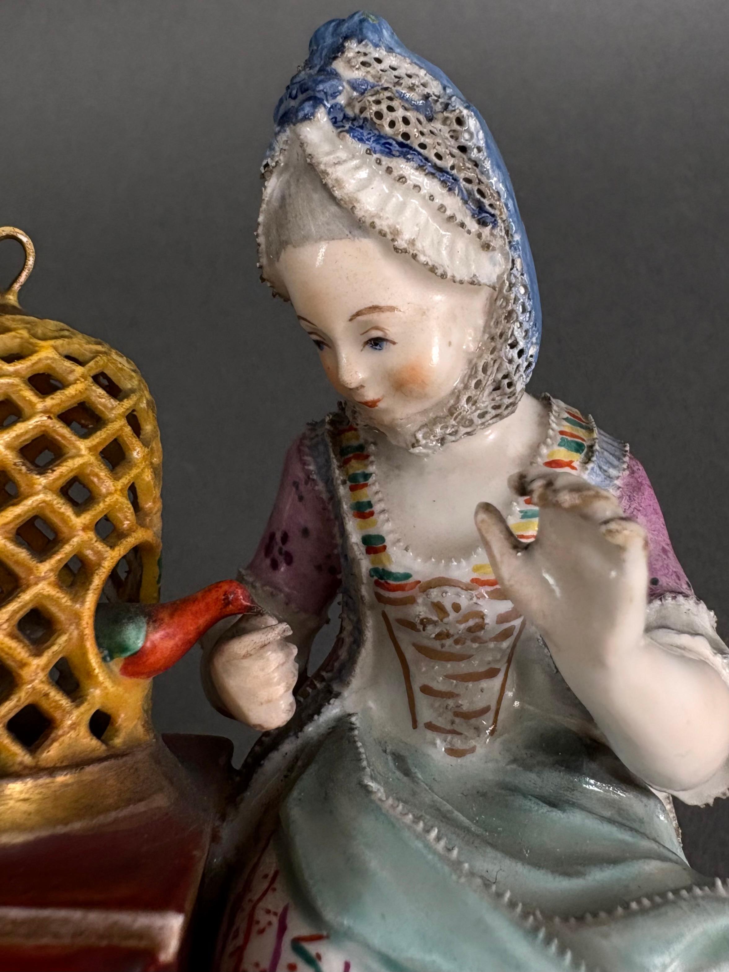 Grupo de porcelana alemana del siglo XIX Dama con pájaro Porcelana en venta
