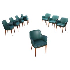 Group of eight Cassina armchairs in green leatherette and beech wood  1950s