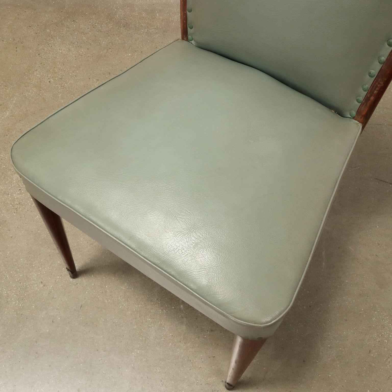 Mid-20th Century Group of six 1950s Chairs in wood and sage green leatherette For Sale