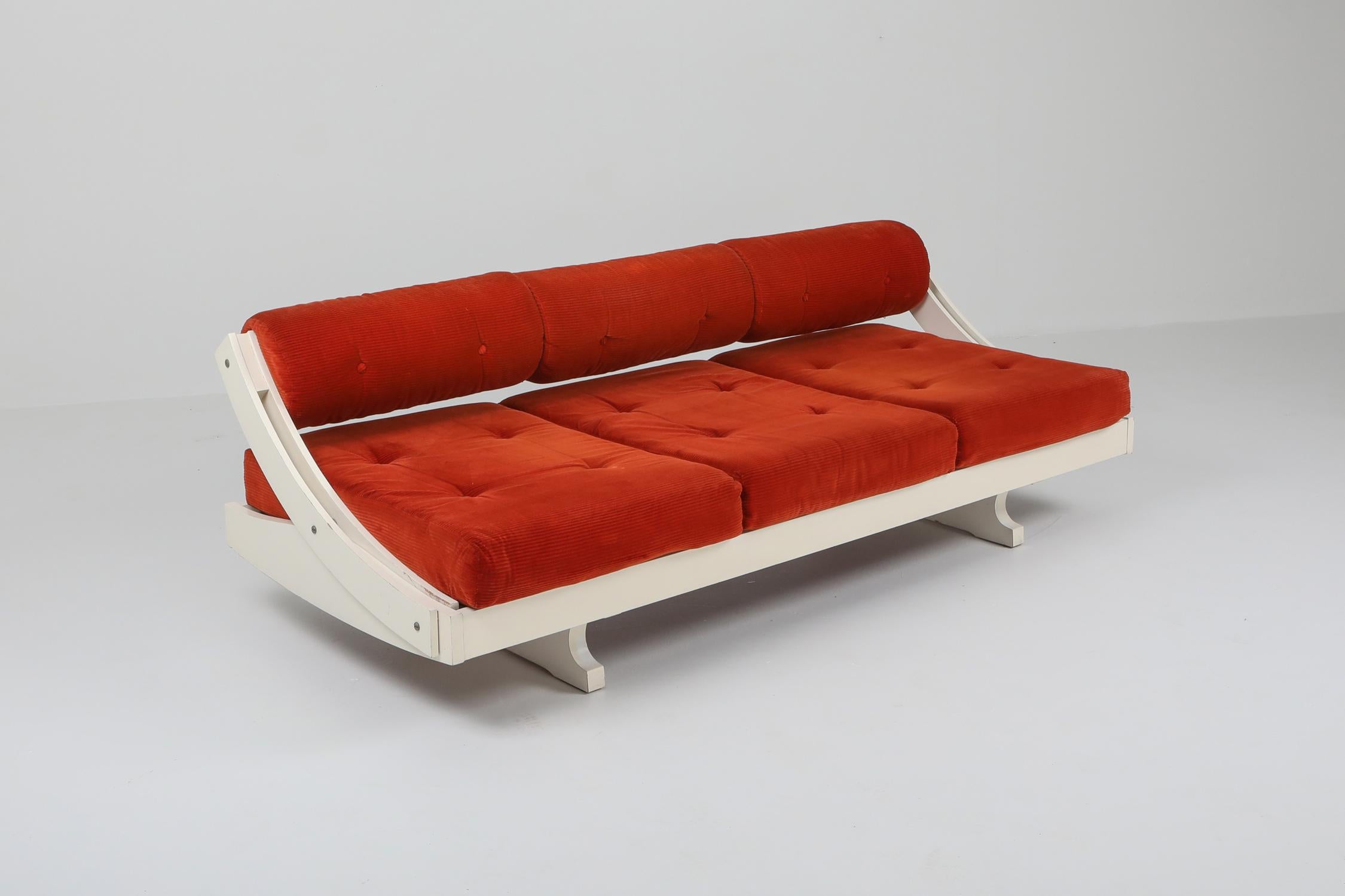 Mid-century modern daybed and sofa model GS195 made by Gianni Songia for Sormani. White lacquered base with red velvet upholstery. The backrest can be adapted to make it a comfortable daybed. Made in Italy, 1963.