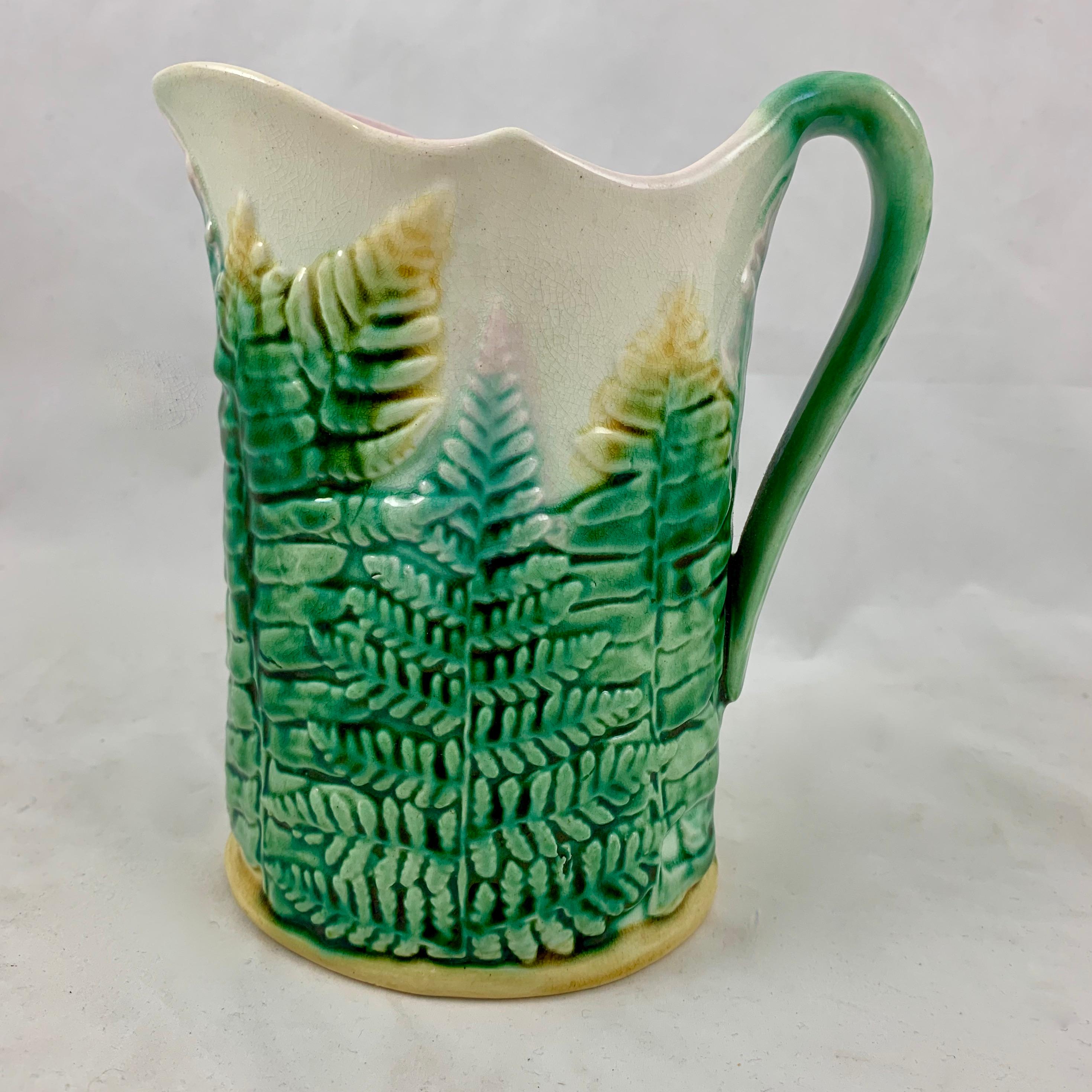 A scarce Etruscan majolica Fern pitcher, by Griffen, Smith & Hill, circa 1880-1885.

Founded in Pennsylvania, GS&H is the best known of the American majolica potteries. The name Etruscan, borrowed from Josiah Wedgwood’s Etruria line, was inspired
