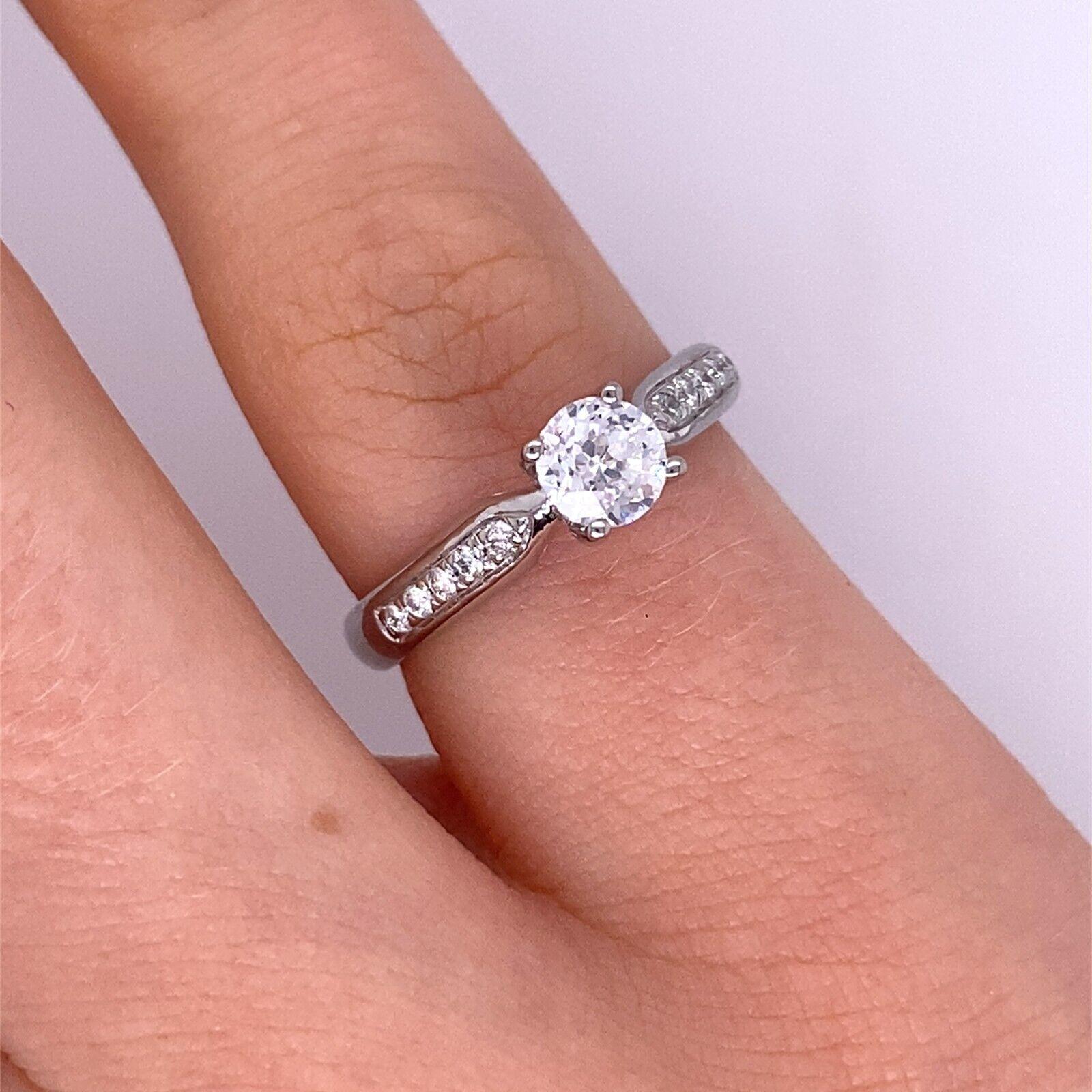 GSI Certified Classic Solitaire 0.47ctF I1 Round Modified Brilliant Diamond Ring In Excellent Condition For Sale In London, GB