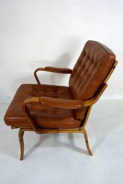 Pair of Scandinavian Midcentury Modern Wood and Leather Armchairs by Göte Möbel