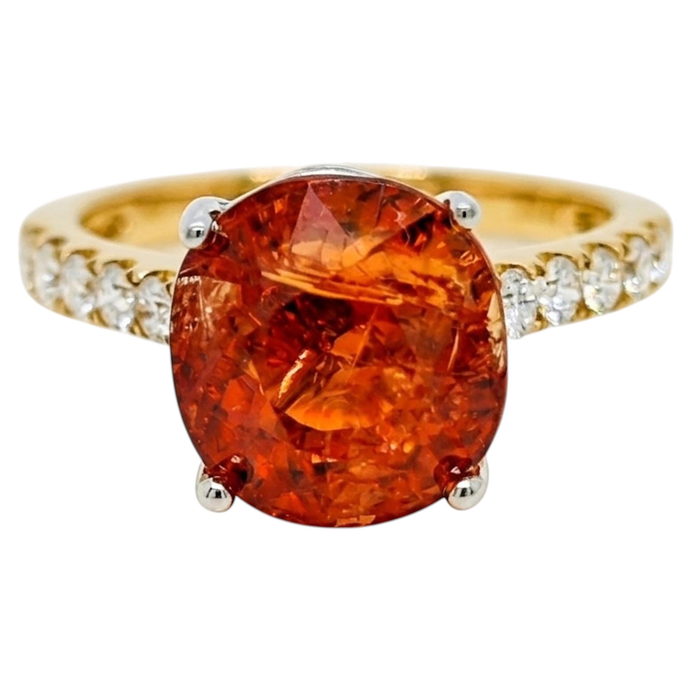 GU Anillo de oro amarillo y blanco con diamante en cojín y granate Fanta certificado de 0,75 quilates
