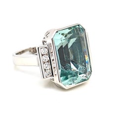 Anello in oro bianco con diamante rotondo e acquamarina certificata GU 15,46