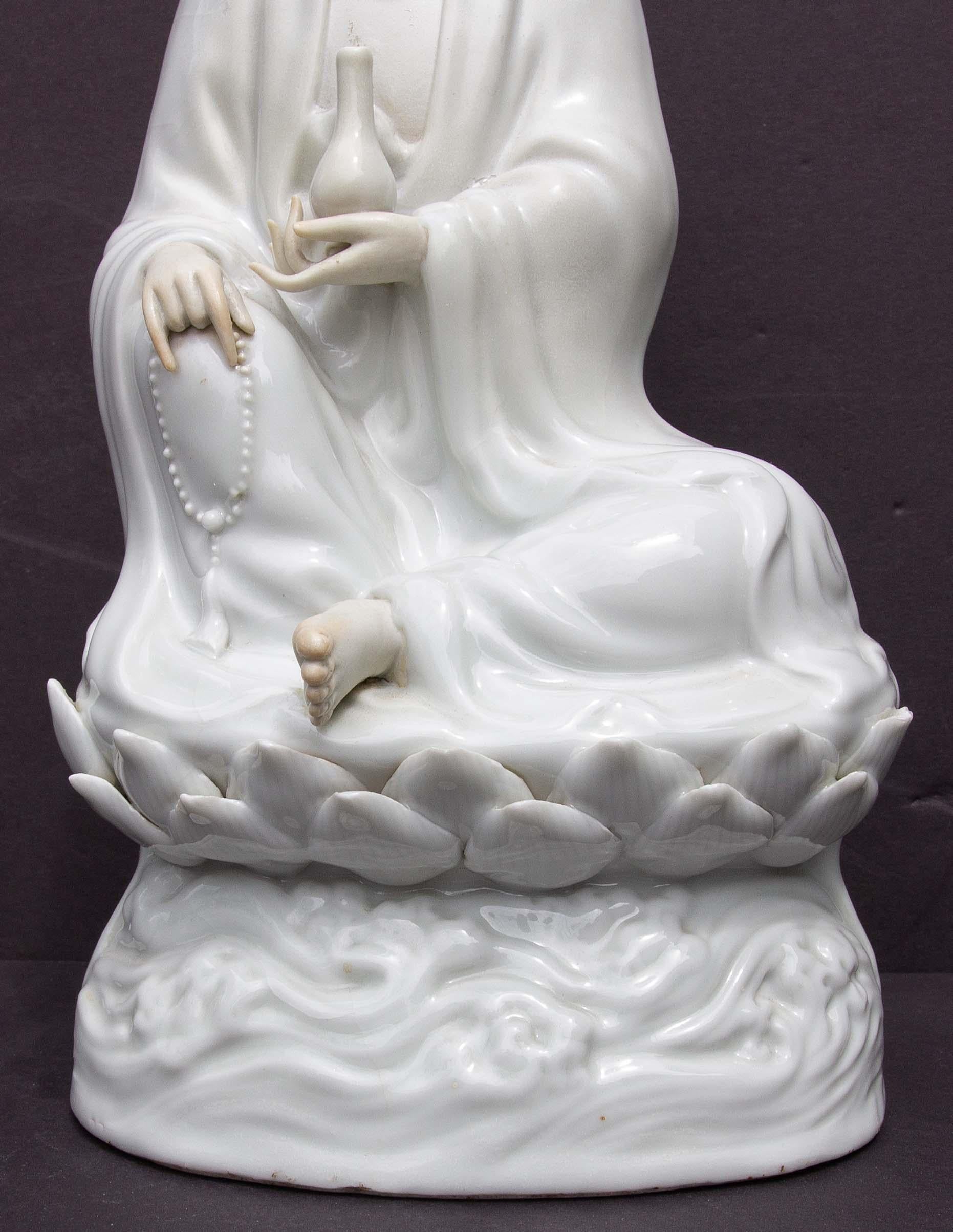 Asian Guanyin Sitting on a Lotus Flower in Blanc De Chine Chinese Figure For Sale