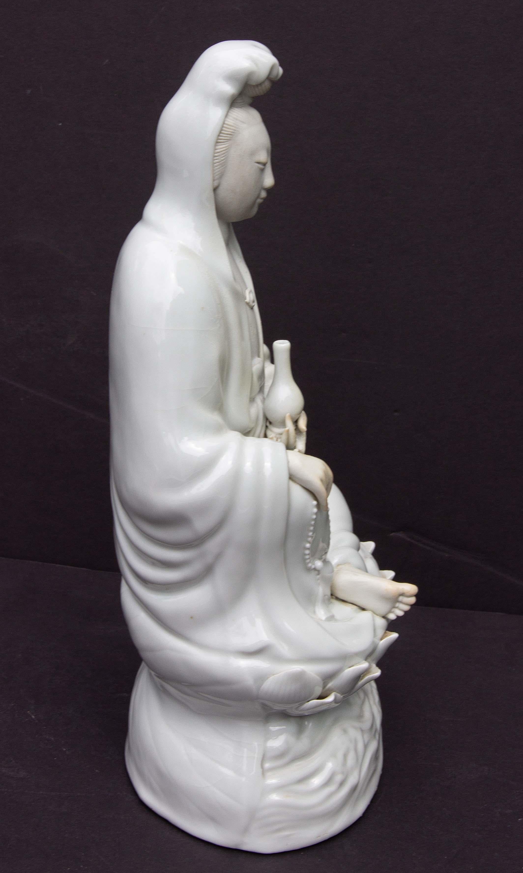 Guanyin Sitting on a Lotus Flower in Blanc De Chine Chinese Figure In Good Condition For Sale In Rochester, NY