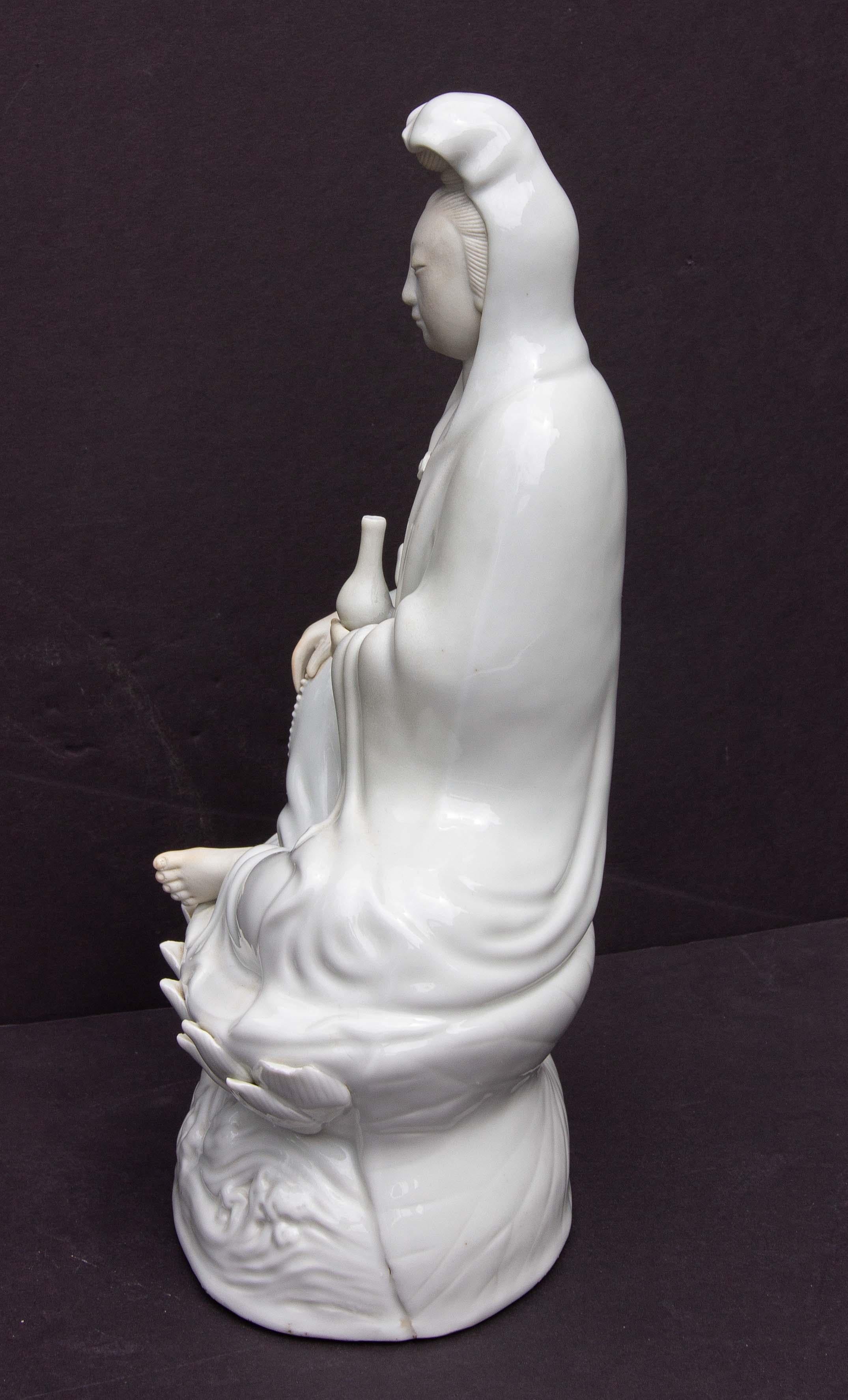 20th Century Guanyin Sitting on a Lotus Flower in Blanc De Chine Chinese Figure For Sale