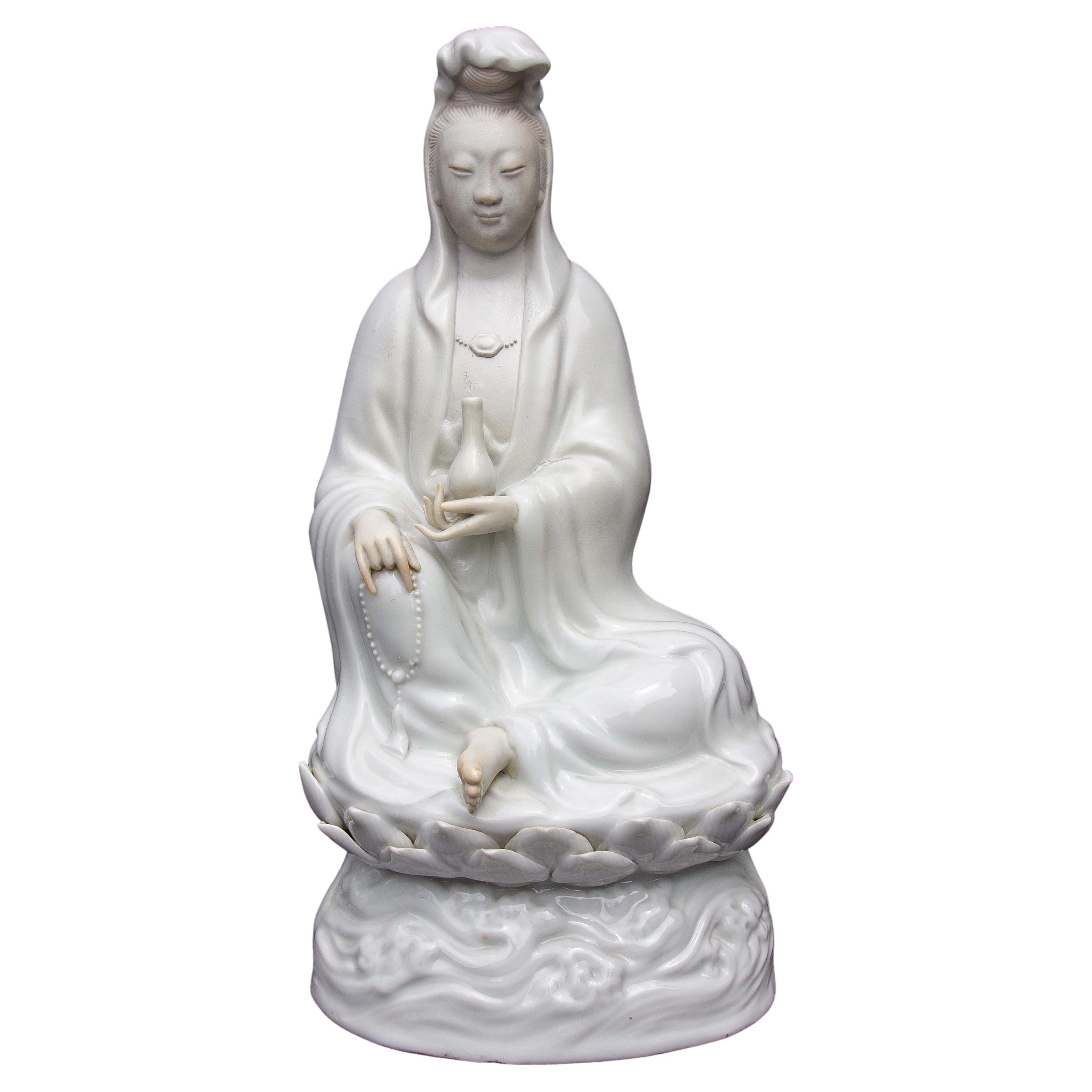 Guanyin Sitting on a Lotus Flower in Blanc De Chine Chinese Figure For Sale