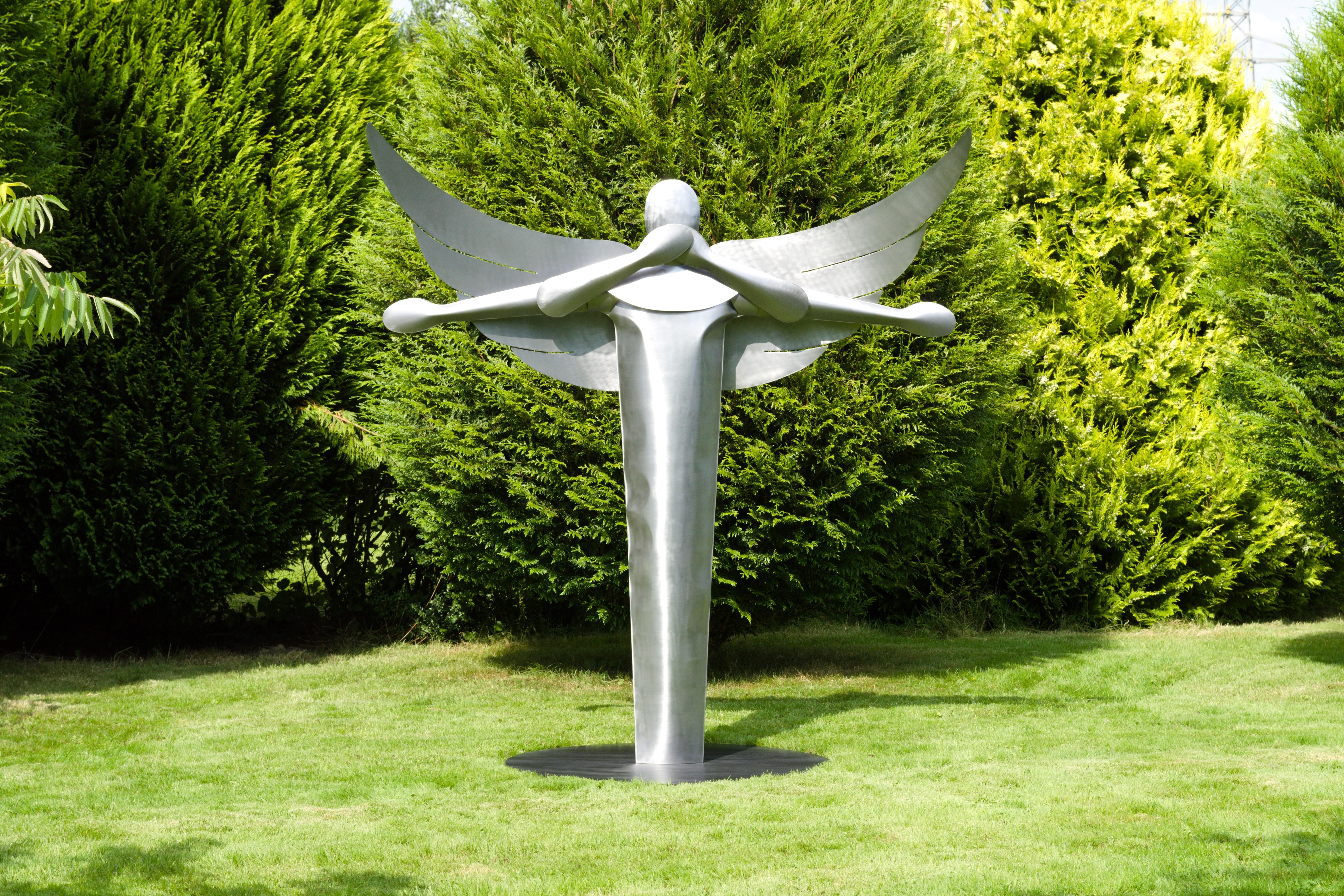 Created during the Coronavirus pandemic, ‘Guardian Angel’ personifies the safety measures of covering your face and social distancing. The overall shape of the sculpture is a reference to the Caduceus, or Staff of Hermes, used as a symbol for