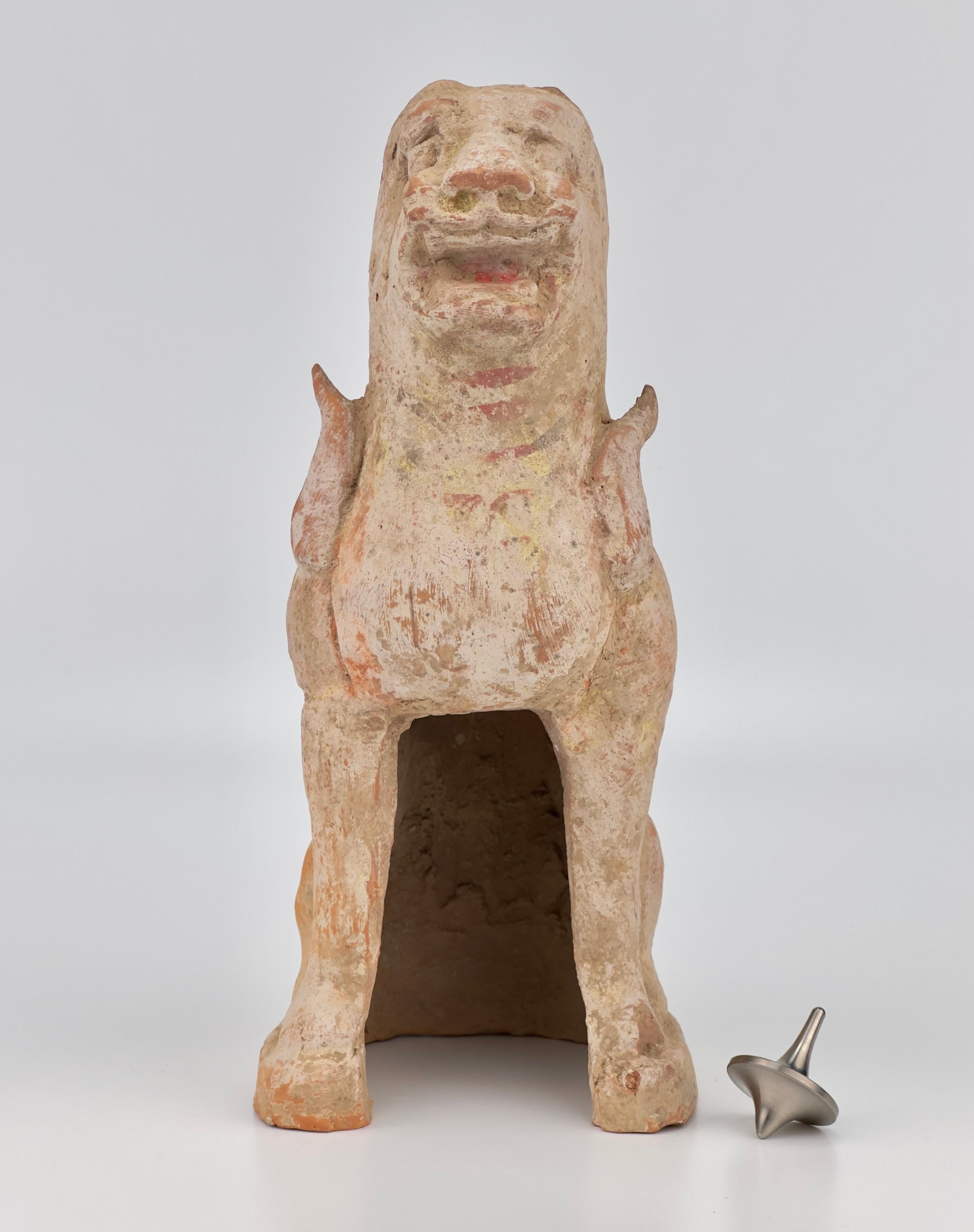 This figure represent a guardian haitai. The style of the figurine, with its facial features and remnants of paint, suggests it could be a part of funerary art, which was common in Chinese culture during these periods.

Date : Northern Wei-Tang