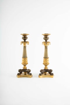 Guardians of the Flame: Pair of Early 19th C Gilt Bronze French Candlesticks