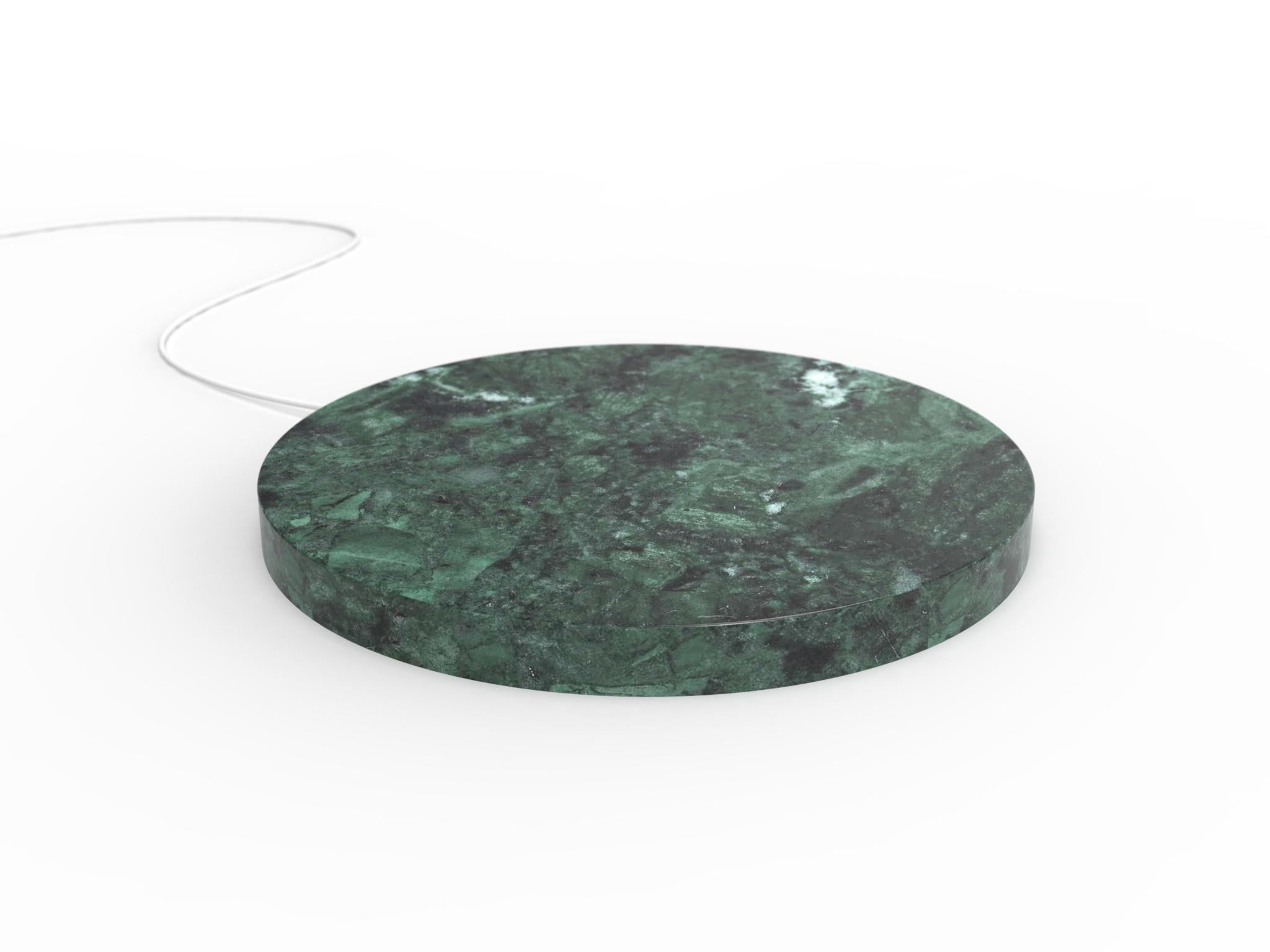 A marble base,
that quickly charge your phone, with a touch of magic.
 
A circle, 
a stone, 
realized with the care that marble requires.

A powerful wireless charging technology ensures an efficient and reliable power delivery.

The result is a