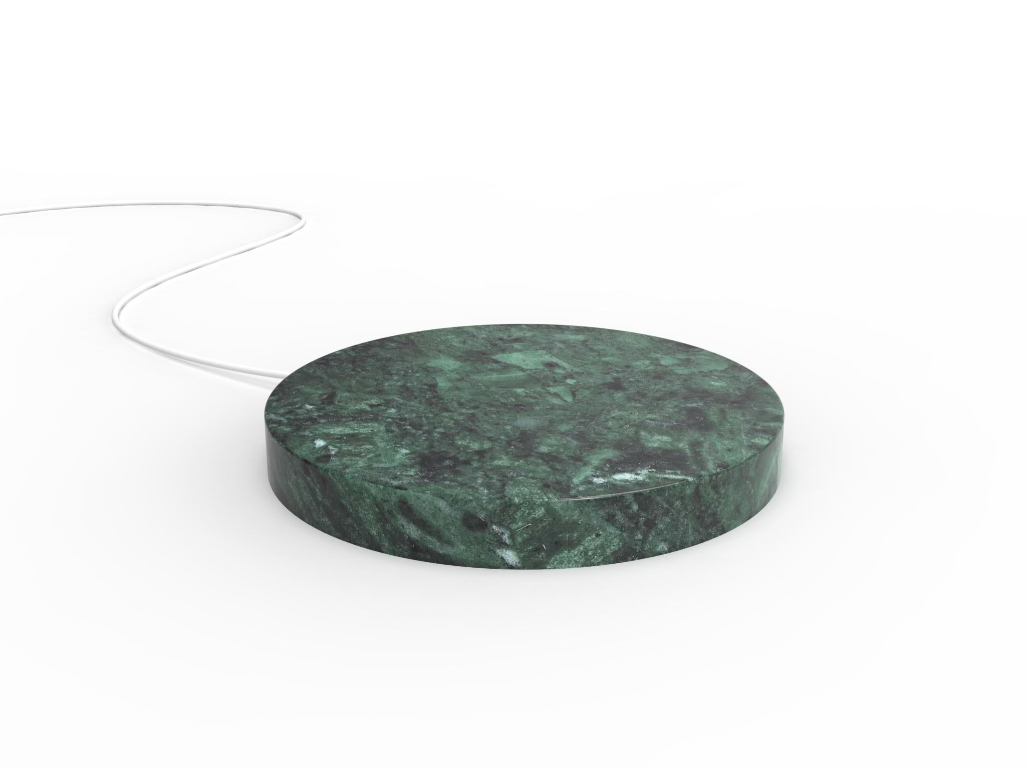 A marble base,
that quickly charge your phone, with a touch of magic.
 
A circle,
a stone,
realized with the care that marble requires.

A powerful wireless charging technology ensures an efficient and reliable power delivery.

The result is a