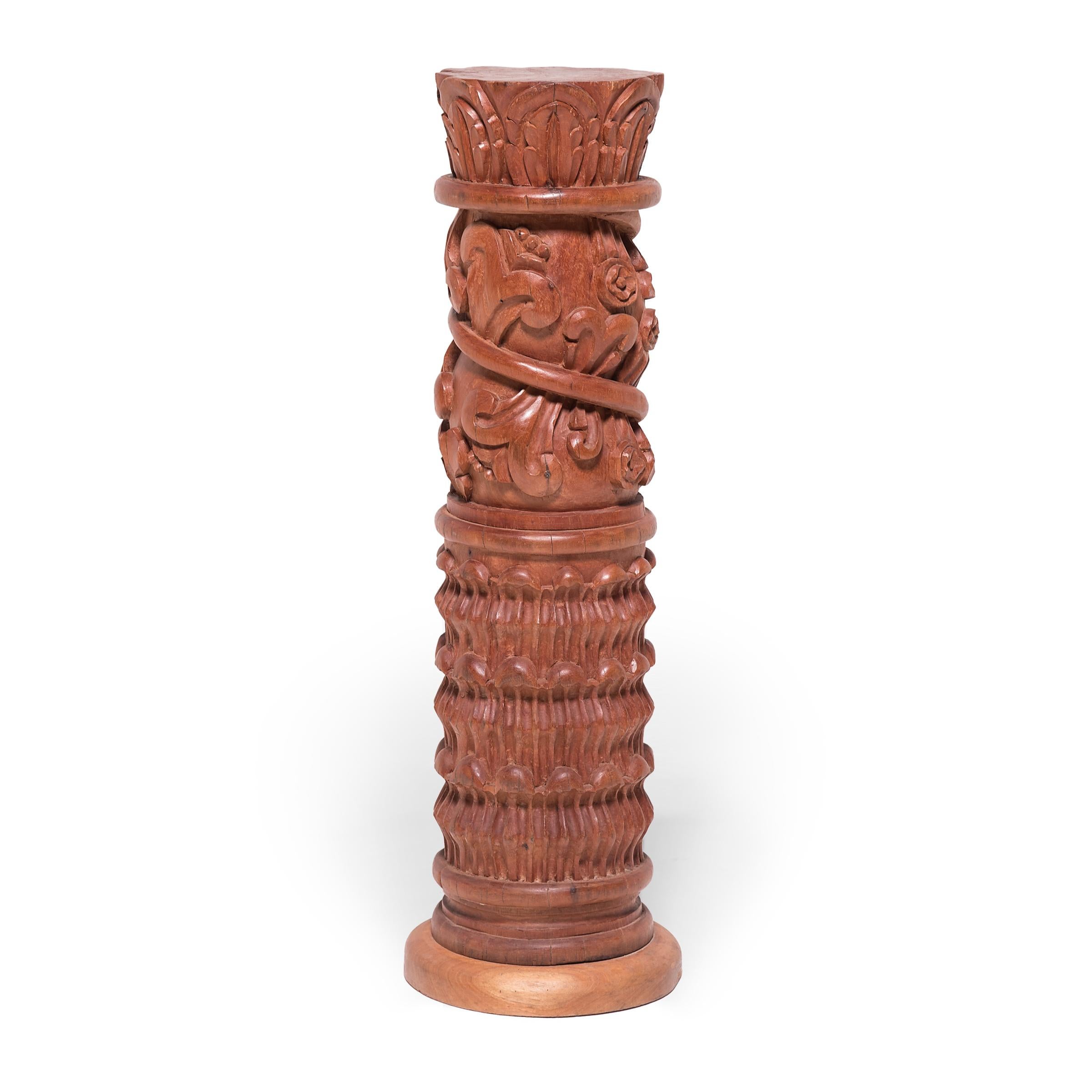 The Maya peoples of Guatemala created incredible works of art through columnar woodworking and stone shaping. The geometric vertical carvings provide a low field that flourishes into the foliated top half. As the vines crawl upward and become leaves