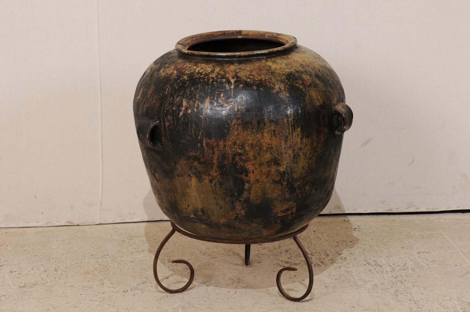 Patinated Guatemalan Ceramic Jar on Custom Scrolled Stand with Lovely Patina & Warm Hues For Sale