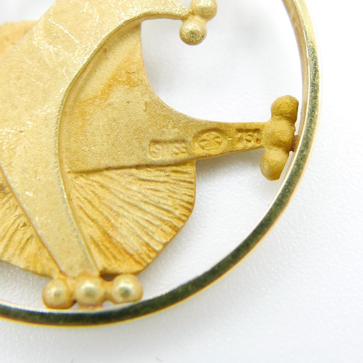 gold leo pendant