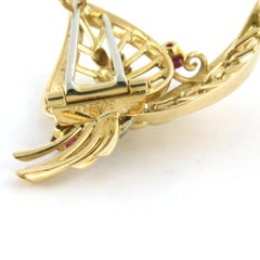 Gübelin Broche de oro bicolor de 18 quilates con rubí y diamante, circa 1990