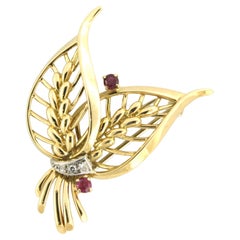 Gübelin - 18k gold brooch with ruby and single-cut diamond, 0.05ct 8.9 grams