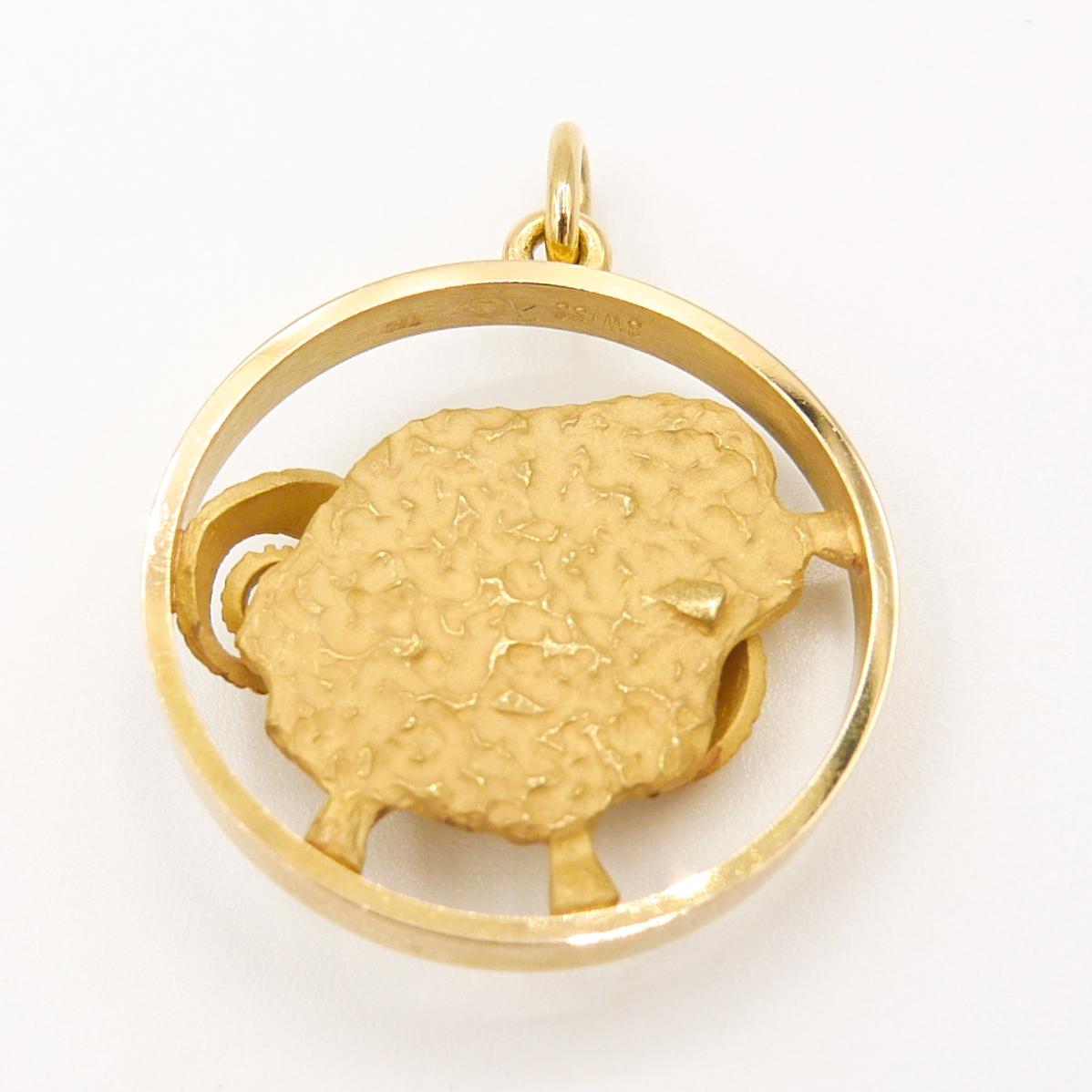 Gübelin 18k Yellow Gold ARIES Zodiac Pendant/Charm
1 inch diameter
7.5mm bail

Chain not included
