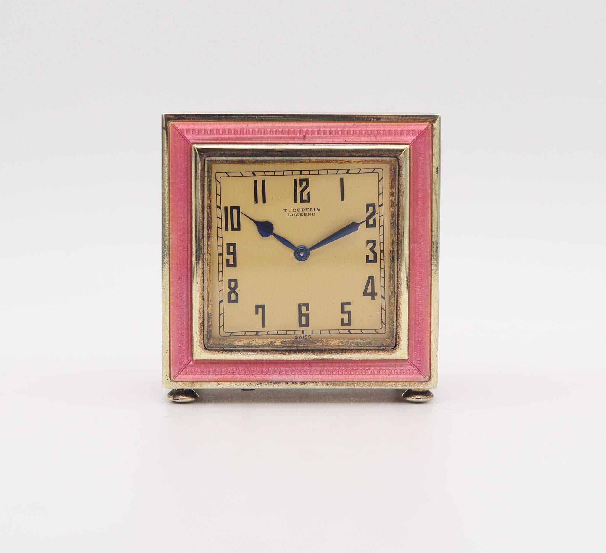 Art deco miniature boudoir desk clock made by Gübelin.

Fabulous miniature desk clock, created in Lucerne Switzerland by the E Gübelin & Co. during the art deco period, back in the 1925. The craftsmanship of this boudoir clock is exceptional,