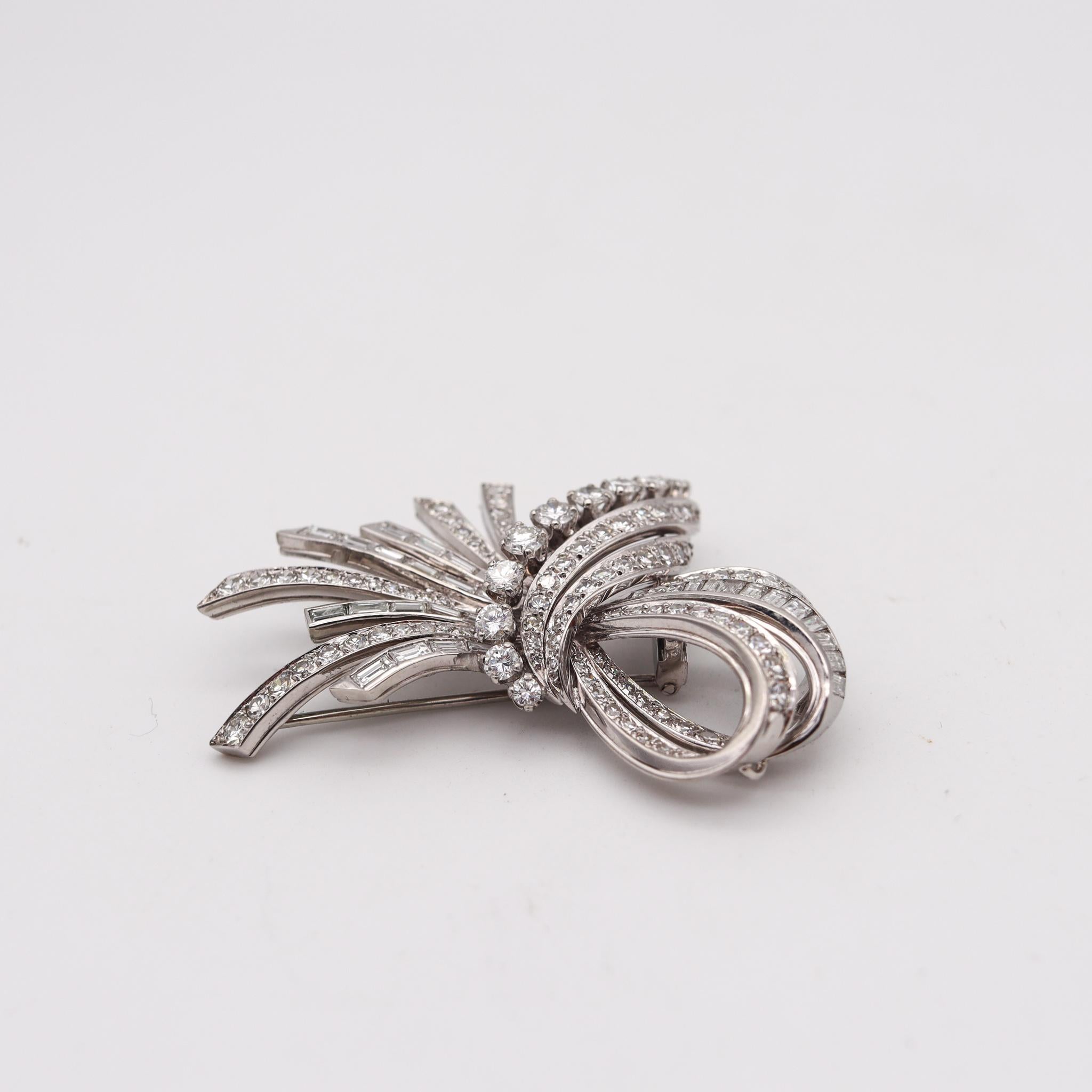 An exceptional brooch designed by Gubelin.

Beautiful and elegant piece, created in Zurich Switzerland by the famous jewelry house of Gubelin during the post war period, circa 1950. This stunning one of a kind rare brooch has been crafted in solid