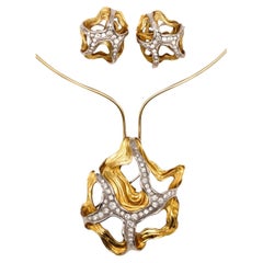 Gubelin Pendentifs convertibles suisses de 1960, sertis en or 18 carats et diamants 6,84 carats