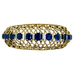 Gubelin 1960's 18k gold, sapphire and diamond bangle
