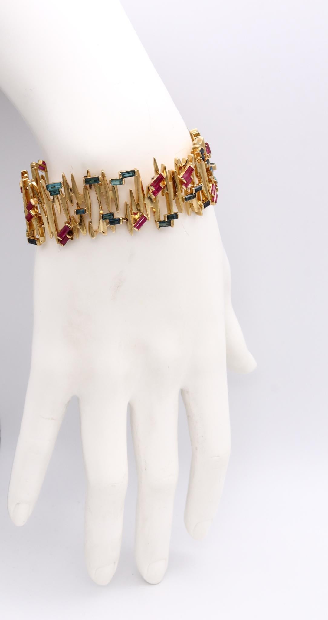 A jeweled bracelet designed by Gubelin.

Gorgeous piece that defines the brutalist jewelry style of the European post-war period. This wonderful bracelet has been created in Switzerland by the house of Gubelin at the beginning of the decade of the