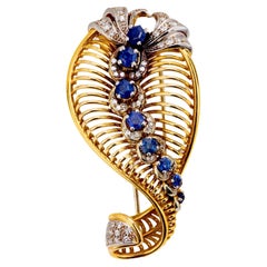 Gubelin 3 carat sapphire diamond 18k yellow gold brooch