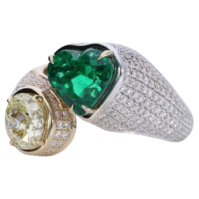 The perfect Valentine's gift!! a true statement piece for any jewelry collection. The centerpiece boasts a breathtaking Gubelin certified emerald, weighing an impressive 2.15 carats, known for its deep, vibrant green color and exceptional clarity,