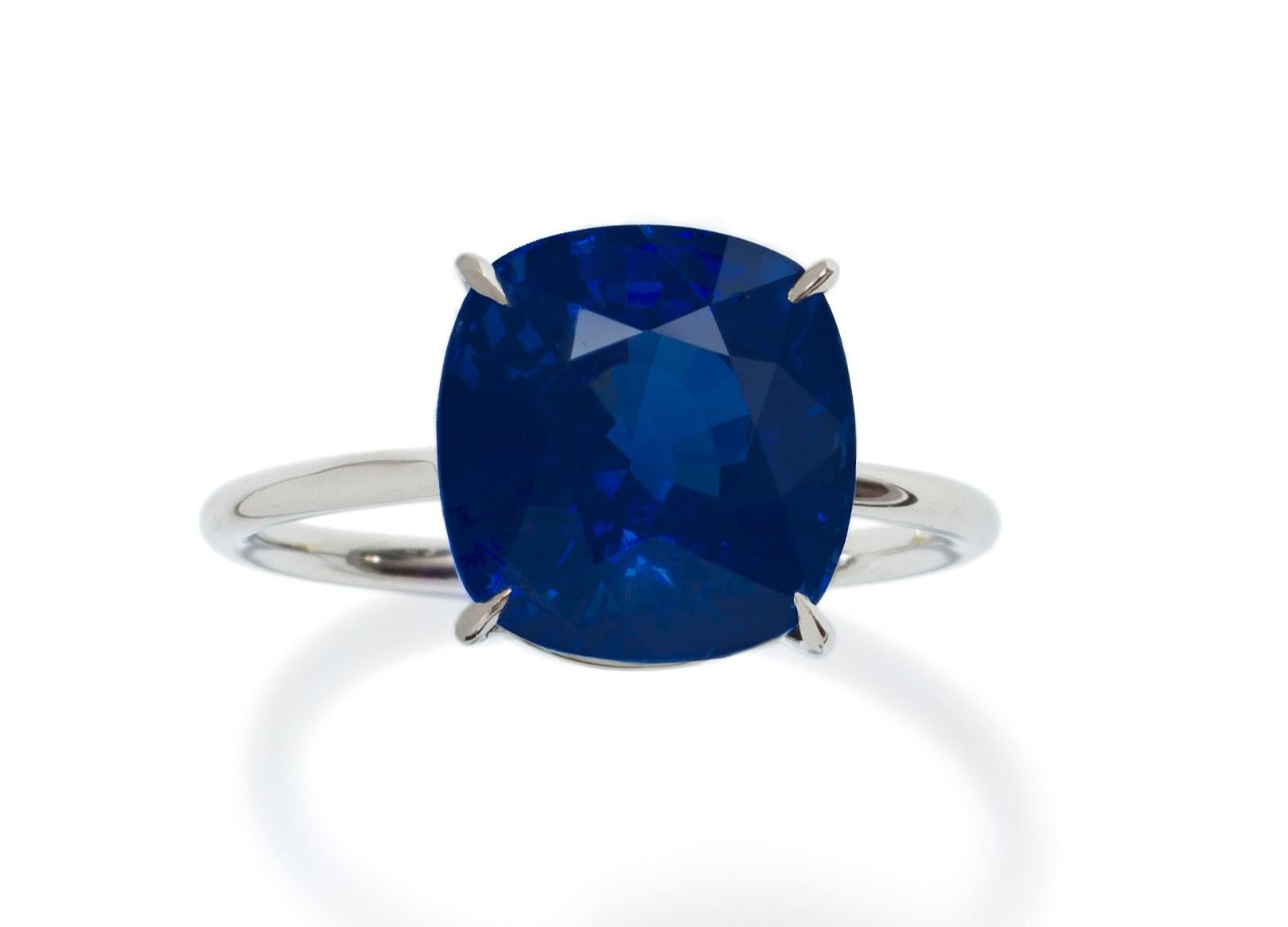 Featuring a natural cushion-cut blue sapphire weighing 7.11 carats. Accompanied by a Gübelin gemological report stating that the sapphire is of Burmese origin with no trace of thermal enhancement. Mounted in 18k white gold. Made in Switzerland.