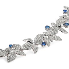 Gubelin Belize Diamant & Blauer Saphir Blumenmotiv-Armband 18K Weißgold